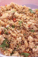 Fried rice put crab on dish