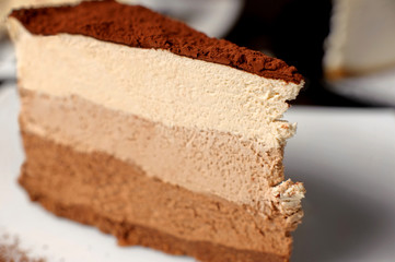 Chocolate cheesecake on a dark background