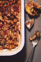 Home made baked beans in rustic baking dish
