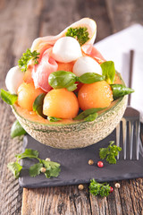 salad in melon bowl