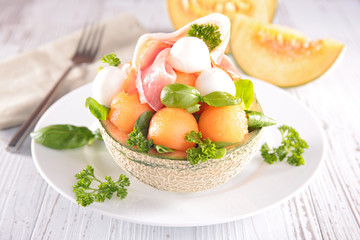 salad in melon bowl