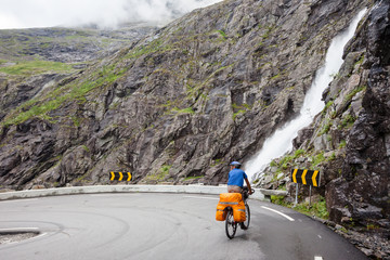 Biking in Norway against picturesque landscape