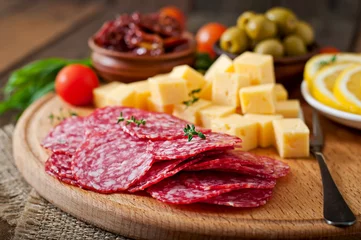 Zelfklevend Fotobehang Antipasto catering platter with salami and cheese  © timolina