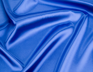 Blue silk texture cloth. Close up.