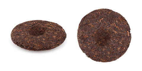 Disc of pressed puer tea on white background, side and top view