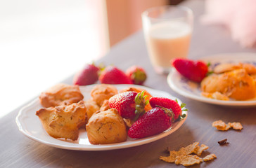 Strawberry in a plate on white background