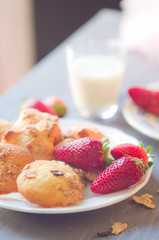 Strawberry in a plate on white background