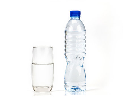 fresh drink water bottle and glass on white background