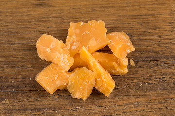 Italian Parmesan Cheese on Wooden Background