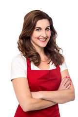 Fototapeta premium Confident female chef over white