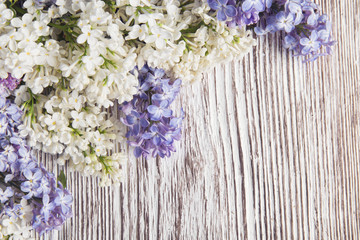 Lilac Flowers Bouquet on Wooden Plank Background, Spring Purple