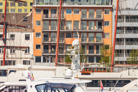 Yachts in front of luxury apartments in Antwerp, Belgium