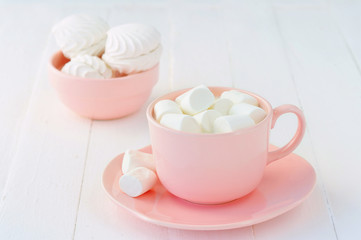 Porcelain pink crockery full of marshmallow souffle