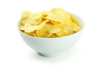 Potato chips in bowl isolated on white