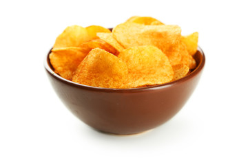 Potato chips in bowl isolated on white