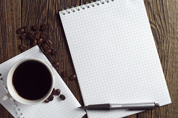 Coffee and opened notebook