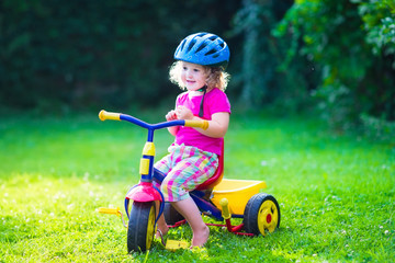 Little girl on a bike