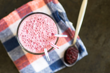 Glass of blackberry smoothie top view