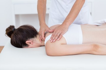 Fototapeta na wymiar Physiotherapist doing back massage 