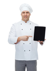 happy male chef cook showing with tablet pc