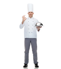 happy male chef cook with cloche showing ok sign