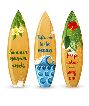 wooden surfboards with type designs