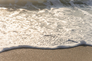 Fototapeta na wymiar Soft wave on the tropical beach