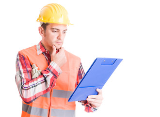 Smart builder thinking and looking on clipboard