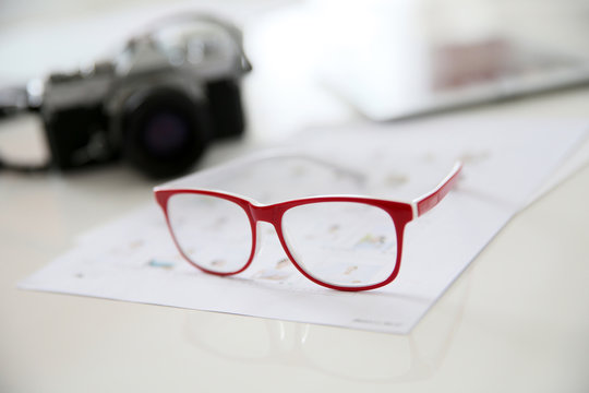 Eyeglasses and photo camera, retro syle