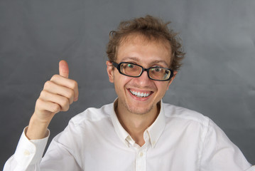 Cute young man with laptop.