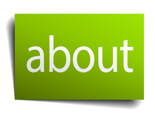 about green paper sign on white background
