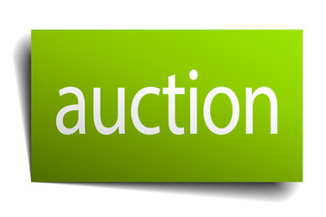 auction green paper sign on white background