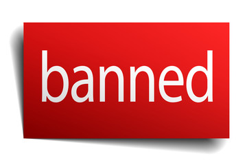 banned red paper sign isolated on white