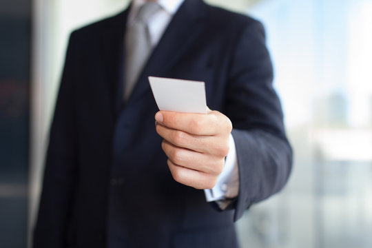 Businessman Giving A Business Card