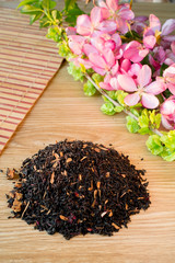 Blend of black tea on a table with colours3.