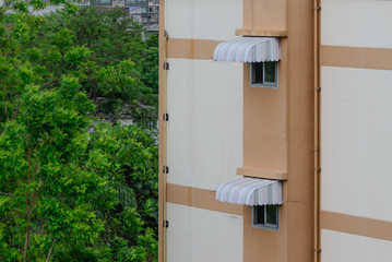 Rainproof awning of slide window. © Eakkaluk
