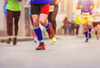 Unrecognizable young runners in the city race