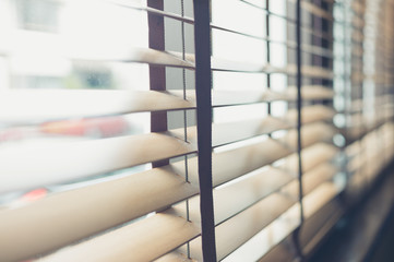 Venetian blinds by the window - Powered by Adobe