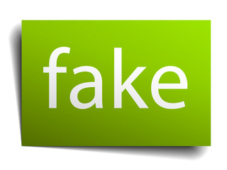 fake green paper sign isolated on white