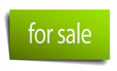 for sale green paper sign isolated on white