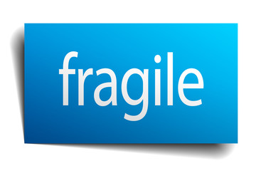 fragile blue paper sign on white background