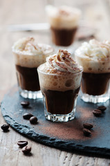 Delicious coffee with crean and cocoa