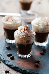 Delicious coffee with crean and cocoa