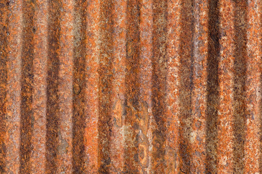 Ribbed rusty metal background