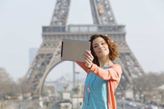 Woman using digital tablet