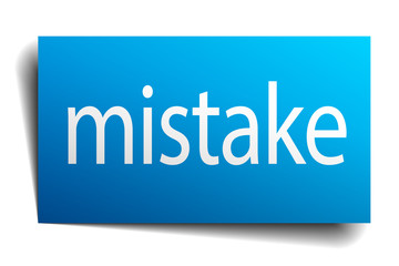 mistake blue paper sign on white background