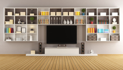 Modern lounge with bookcase and television © archideaphoto