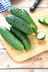 Fresh cucumbers on the cutting board