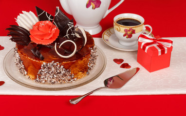 Chocolate cake and cup with gift