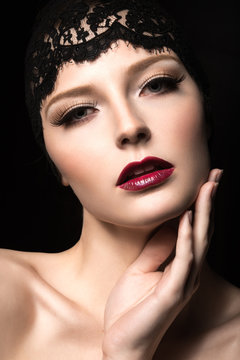 girl with long eyelashes, red lips